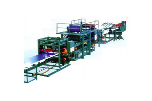 Máquina para la fabricación de placas de acero de color y placas compuestas